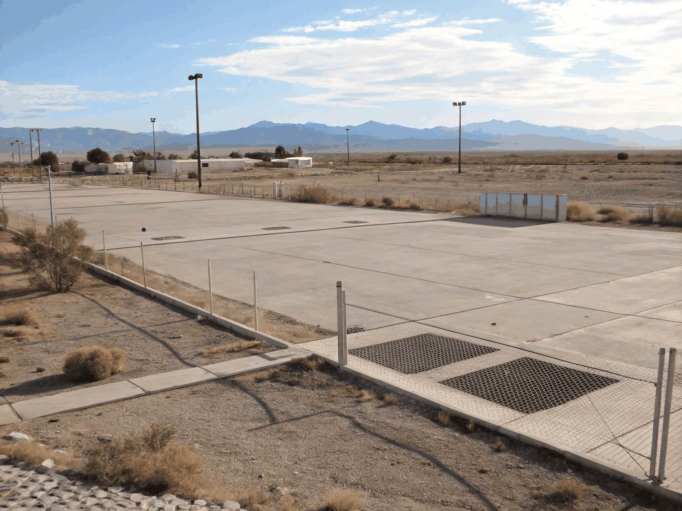 Clean open gravel yard with zero camper debris remaining